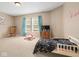 Cozy bedroom with rocking chair and twin bed at 917 Balto Dr, Shelbyville, IN 46176