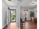 Home entryway with wood floors and view of front porch at 917 Balto Dr, Shelbyville, IN 46176