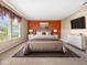 Spacious bedroom with large windows and accent wall at 917 Balto Dr, Shelbyville, IN 46176