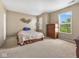 Bedroom with double windows and neutral walls at 917 Balto Dr, Shelbyville, IN 46176