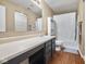 Bathroom with tub, toilet and vanity at 917 Balto Dr, Shelbyville, IN 46176