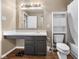 Clean bathroom with vanity, toilet, and bathtub at 917 Balto Dr, Shelbyville, IN 46176
