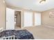 Spacious bedroom with ample closet space and neutral carpeting at 917 Balto Dr, Shelbyville, IN 46176