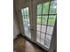 French doors leading to backyard with green lawn and patio at 1231 E 88Th St, Indianapolis, IN 46240