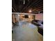 Unfinished basement with exposed beams and potential for expansion at 1231 E 88Th St, Indianapolis, IN 46240
