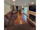 Spacious living room with hardwood floors and fireplace at 1231 E 88Th St, Indianapolis, IN 46240