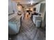 Modern kitchen with white shaker cabinets, granite countertops, and herringbone flooring at 1231 E 88Th St, Indianapolis, IN 46240