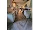 Modern kitchen with white shaker cabinets, granite countertops, and herringbone flooring at 1231 E 88Th St, Indianapolis, IN 46240