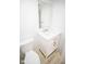 Simple bathroom with white vanity and mirror at 2424 N Willow Way, Indianapolis, IN 46268