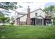 Back of townhome with sunroom and deck at 2424 N Willow Way, Indianapolis, IN 46268