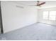 Spacious bedroom with ceiling fan and light grey carpet at 2424 N Willow Way, Indianapolis, IN 46268