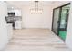 Bright dining area with hardwood floors and sliding glass doors at 2424 N Willow Way, Indianapolis, IN 46268