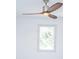 Bright bedroom with ceiling fan and window at 2424 N Willow Way, Indianapolis, IN 46268