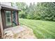 Back patio with access to green space at 2424 N Willow Way, Indianapolis, IN 46268