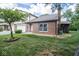 Brick townhome with sunroom and green space at 2424 N Willow Way, Indianapolis, IN 46268