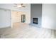 Bright living room featuring a fireplace and hardwood floors at 2424 N Willow Way, Indianapolis, IN 46268