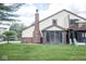 Back of townhome with sunroom and deck at 2424 N Willow Way, Indianapolis, IN 46268