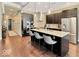 Modern kitchen with stainless steel appliances and granite countertops at 1 Virginia Ave # 703, Indianapolis, IN 46204