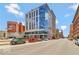 Modern building exterior on a city street with street parking at 1 Virginia Ave # 703, Indianapolis, IN 46204
