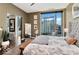 Spacious bedroom with city view and large windows at 1 Virginia Ave # 703, Indianapolis, IN 46204