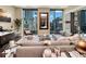 Luxury living room with hardwood floors and city views at 1 Virginia Ave # 703, Indianapolis, IN 46204