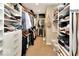 Large walk-in closet with ample shelving and hanging space at 1 Virginia Ave # 703, Indianapolis, IN 46204