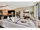 Open living area features hardwood floors and city views at 1 Virginia Ave # 703, Indianapolis, IN 46204