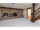 Stone fireplace in finished basement at 6835 Fox Lake S Dr, Indianapolis, IN 46278