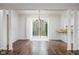 Dining room with hardwood floors and sliding glass doors at 6835 Fox Lake S Dr, Indianapolis, IN 46278