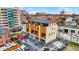 Aerial view of modern three-story townhome with attached garage at 527 E North St, Indianapolis, IN 46204