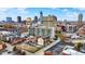 Aerial view of townhome with city skyline in the background at 527 E North St, Indianapolis, IN 46204