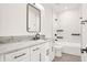 Modern bathroom with white cabinets and a walk-in shower at 527 E North St, Indianapolis, IN 46204