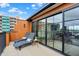 Spacious rooftop deck with lounge chairs and stunning views at 531 E North St, Indianapolis, IN 46204