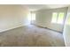 Spacious bedroom with neutral carpeting and large windows at 681 Ironwood Dr, Avon, IN 46123