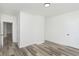 Simple bedroom with wood-look floors and white walls at 22133 State Road 37 N, Noblesville, IN 46060