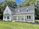 Newly renovated farmhouse with front porch at 22133 State Road 37 N, Noblesville, IN 46060