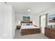 Bright bedroom with a wooden bed frame and window light at 22133 State Road 37 N, Noblesville, IN 46060