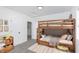 bedroom with a wooden bunk bed and playful decor at 22133 State Road 37 N, Noblesville, IN 46060
