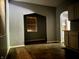 Dining area with gray walls and boarded window at 642 N Oxford St, Indianapolis, IN 46201