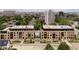Two modern apartment buildings with landscaped grounds at 877 N East St # 104, Indianapolis, IN 46202