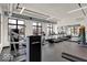 Bright and spacious gym featuring Life Fitness equipment and large windows at 877 N East St # 104, Indianapolis, IN 46202