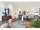 Spacious living room with hardwood floors and a modern aesthetic at 877 N East St # 104, Indianapolis, IN 46202