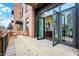 Private patio with brick wall and access from the interior at 877 N East St # 104, Indianapolis, IN 46202