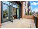 Private patio with brick wall and access to the living area at 877 N East St # 104, Indianapolis, IN 46202