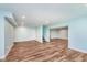 Finished basement with light blue walls and wood floors at 372 Foxboro Cir, Avon, IN 46123