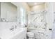 Clean bathroom with white vanity, marble tile, and bathtub at 372 Foxboro Cir, Avon, IN 46123