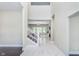 Bright entryway with marble flooring and staircase at 372 Foxboro Cir, Avon, IN 46123