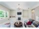 Spacious living room with stone fireplace and sectional sofa at 372 Foxboro Cir, Avon, IN 46123
