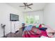 Bedroom with hardwood floors and a ceiling fan at 372 Foxboro Cir, Avon, IN 46123