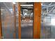 View of indoor riding arena through glass doors at 9407 N Whitney Way, Monrovia, IN 46157